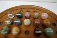 Set of French Marble Orbs on a Turned Solitaire Board (7 of 9) Set of French Marble Orbs on a Turned Solitaire Board (7 of 9)