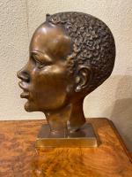 Pair of Art Deco Bronze Profile Studies of Negro Heads (3 of 3) Pair of Art Deco Bronze Profile Studies of Negro Heads (3 of 3)