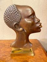 Pair of Art Deco Bronze Profile Studies of Negro Heads (2 of 3) Pair of Art Deco Bronze Profile Studies of Negro Heads (2 of 3)
